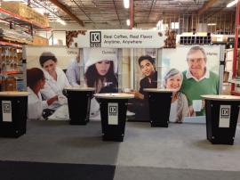RENTAL: Curved Header with Pillowcase Fabric Graphic and (5) Re-1201 Tapered Counter Workstations with Locking Storage
