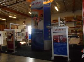 VK-5077 Island Exhibit with Custom Counters, Tension Fabric Graphics, and Wave Canopy -- Image 2