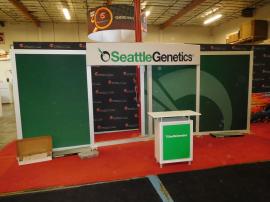 ECO-2054 Sustainable Trade Show Exhibit with ECO-1054 10 ft. Option. Includes Tension Fabric Graphics, Aluminum Extrusion Frame, Header, and ECO-2C Counter with Locking Storage