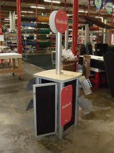 MOD-1227 Workstation with Metal Brochure Holders, Storage, and Sintra Signage -- Image 1