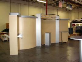 10' x 20' Euro LT Modular Laminate Display with Backlit Header, Literature Bracklets, Counters, and Downlighting