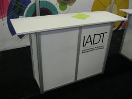 Custom eSmart 10 x 20 with Tension Fabric Graphics, LED Lights, and Custom Reception Podium -- Image 1