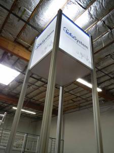 RENTAL:  Custom 20 ft. High Tower with SEG LED Backlit and Sintra Infill Graphics. Includes Locking Door, Large Monitor, and Black Laminated Shelf -- Image 3