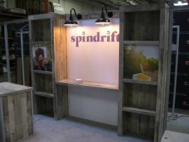 Custom eSmart Sustainable Exhibit with Shelving, SEG Fabric Graphics and 10x20 Conversion with Barn Lighting -- Image 1