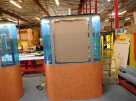 Custom Modular Oval Showcases with Internal LED Lighting, Shelves, and Locking Storage