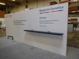 Continuous Laminated Inline Wall with Graphics, Shelf, and Monitor Mount