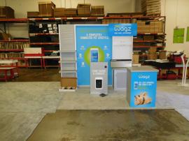 Custom eSmart Exhibit with Shelves, Slatwall, Graphics, Monitor Mount, Locking Storage, Counter, Header, and Custom Doggie Door