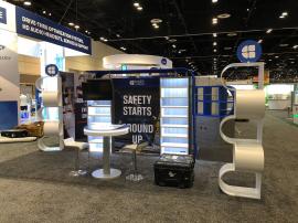 Custom Exhibit with LED Lit Shelving and Backlit SEG Fabric Lightbox