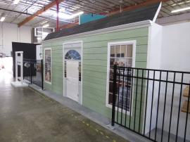 Custom Inline Building Facade with Fence, Shelves, Windows, and Door