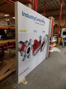 ecoSmart Sustainable Custom Hybrid Exhibit with SEG Fabric Graphic, Shelves, and Monitor Mount