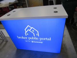 MOD-1700c Backlit Counter with SEG Fabric Graphic, Locking Storage, and Wireless/Wired Charging Ports