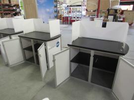 Modified VK-2936 Hybrid Display with Tension Fabric Backwall Graphics and (4) Modular Counters with Locking Storage and Privacy Panels
