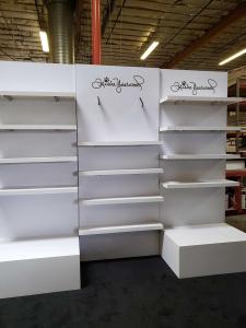 Custom Gravitee One-Step Inline Exhibit with (16) Shelves, Tension Fabric Graphics, MOD-1590 Backlit Counter with Storage, and a MOD-412 Counter with Additional Shelves