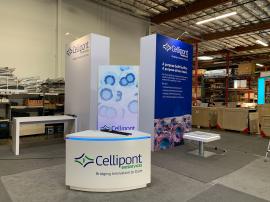 RENTAL: Modified RE-9178 Island Design with (2) Gravitee Storage Towers @ 80" Wide x 27" Deep x 142.5" High, with Locking Doors, (1) Gravitee Double-Sided Kiosk @ 40" Wide x 95" High, (2) Large Monitor Mounts, (1) RE-1579 Counter, (1) RE-1597 Curved Count